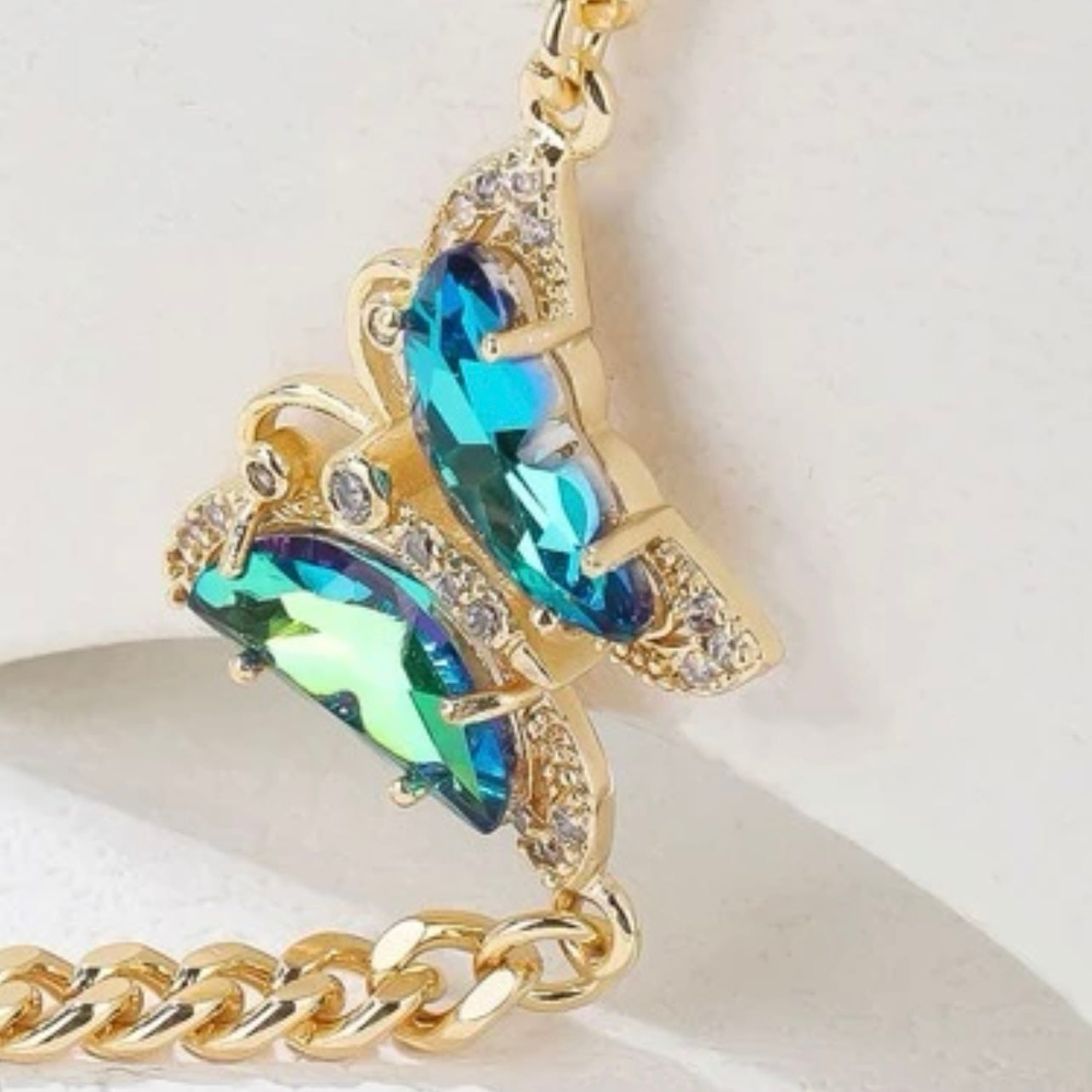 Sparkling Blue Sapphire Butterfly Pendant on 14k Vermeil Gold Cuban Link Bracelet